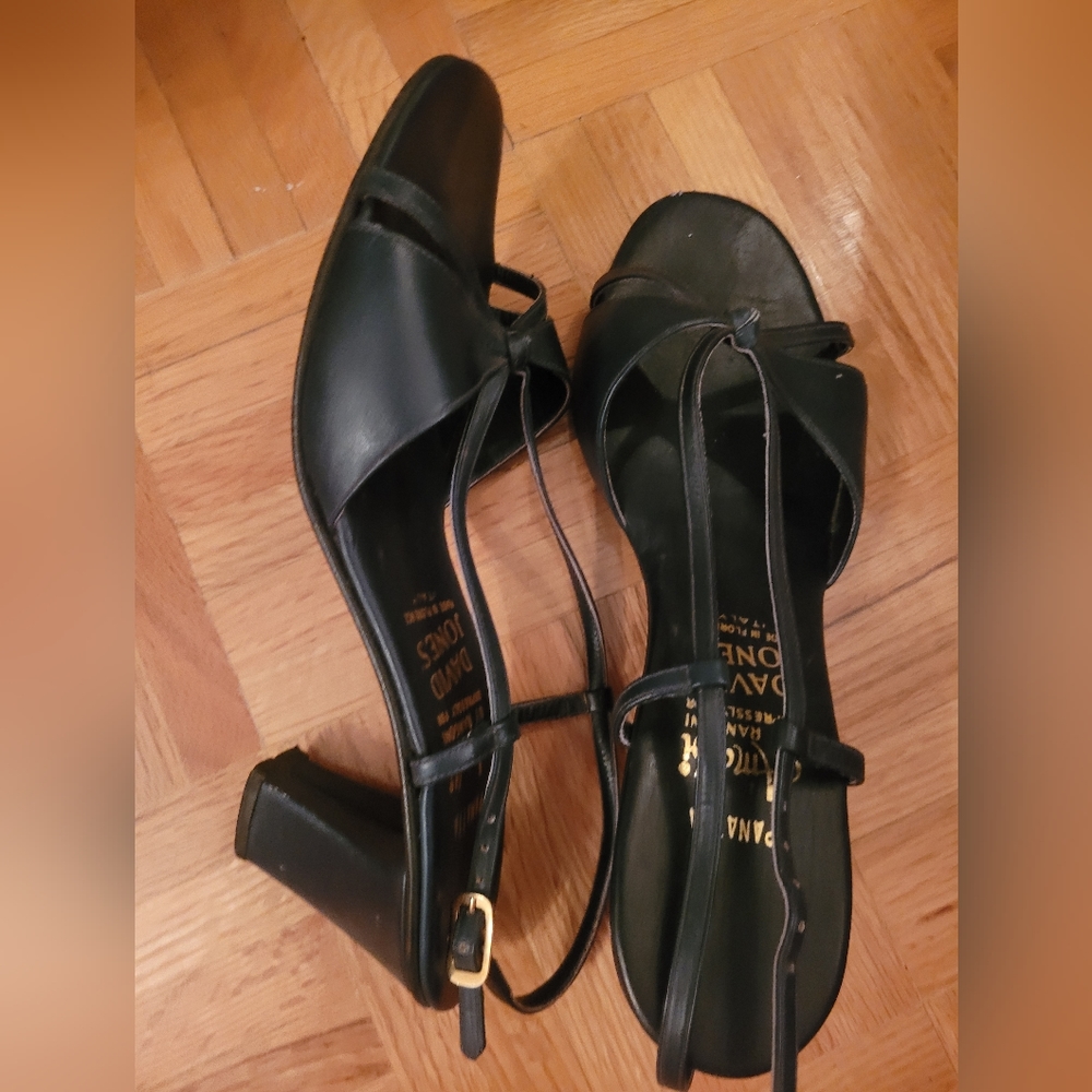 Sling back navy blue leather sandles with 2.5 inch heel. Real leather.